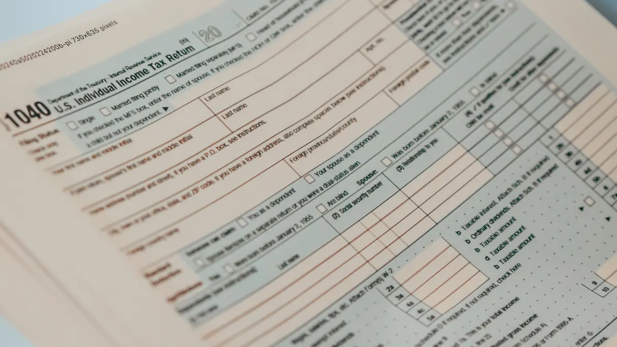 Child tax credit: who qualifies and how it works Close-up of a U.S. 1040 tax form